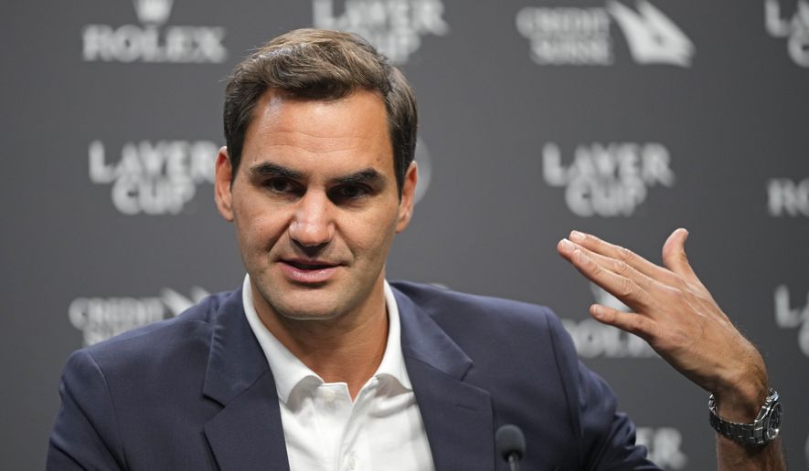 Switzerland&#39;s Roger Federer gestures during a media conference ahead of the Laver Cup tennis tournament at the O2 in London, Wednesday, Sept. 21, 2022. Federer will meet with the media Wednesday to discuss walking away from the game at age 41 after 20 Grand Slam titles. (AP Photo/Kin Cheung)