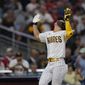 San Diego Padres&#39; Ha-Seong Kim reacts after hitting a home run during the fourth inning of the team&#39;s baseball game against the St. Louis Cardinals, Tuesday, Sept. 20, 2022, in San Diego. (AP Photo/Gregory Bull)