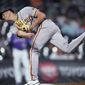San Francisco Giants relief pitcher Tyler Rogers works against the Colorado Rockies during the second inning of a baseball game Tuesday, Sept. 20, 2022, in Denver. (AP Photo/David Zalubowski)