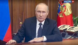 In this image made from a video released by the Russian Presidential Press Service, Russian President Vladimir Putin addresses the nation in Moscow, Russia, Wednesday, Sept. 21, 2022. (Russian Presidential Press Service via AP)