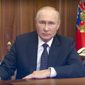 In this image made from a video released by the Russian Presidential Press Service, Russian President Vladimir Putin addresses the nation in Moscow, Russia, Wednesday, Sept. 21, 2022. (Russian Presidential Press Service via AP)