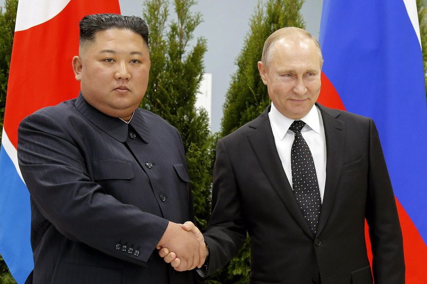 Russian President Vladimir Putin, right, and North Korea&#39;s leader Kim Jong Un shake hands during their meeting in Vladivostok, Russia, April 25, 2019. North Korea says it has not exported any weapons to Russia during the war in Ukraine and has no plans to do so, and said U.S. intelligence reports of weapons transfers were an attempt to tarnish North Korea&#39;s image. (AP Photo/Alexander Zemlianichenko, Pool, File)