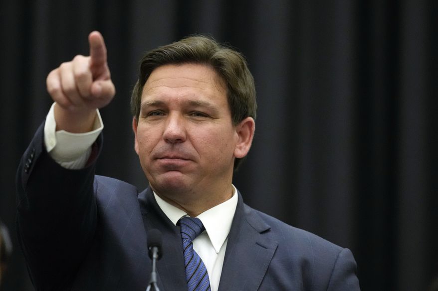 Florida Gov. Ron DeSantis calls on a journalist during a press conference, Thursday, Sept. 22, 2022, in Miami. (AP Photo/Rebecca Blackwell)