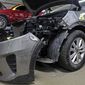 A Kia which was damaged after being stolen is seen at an auto repair shop in Milwaukee on Wednesday, Jan. 27, 2021.  Some Hyundai and Kia cars and SUVs are missing a key anti-theft device, and the crooks have figured it out. An insurance industry group says they&#39;re being stolen at a rate nearly double the rest of the auto industry because they don&#39;t have computer chips in the keys. (Angela Peterson//Milwaukee Journal-Sentinel via AP)