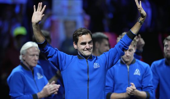 An emotional Roger Federer of Team Europe acknowledges the crowd after playing with Rafael Nadal in a Laver Cup doubles match against Team World&#39;s Jack Sock and Frances Tiafoe at the O2 arena in London, Friday, Sept. 23, 2022. Federer&#39;s losing doubles match with Nadal marked the end of an illustrious career that included 20 Grand Slam titles and a role as a statesman for tennis. (AP Photo/Kin Cheung)