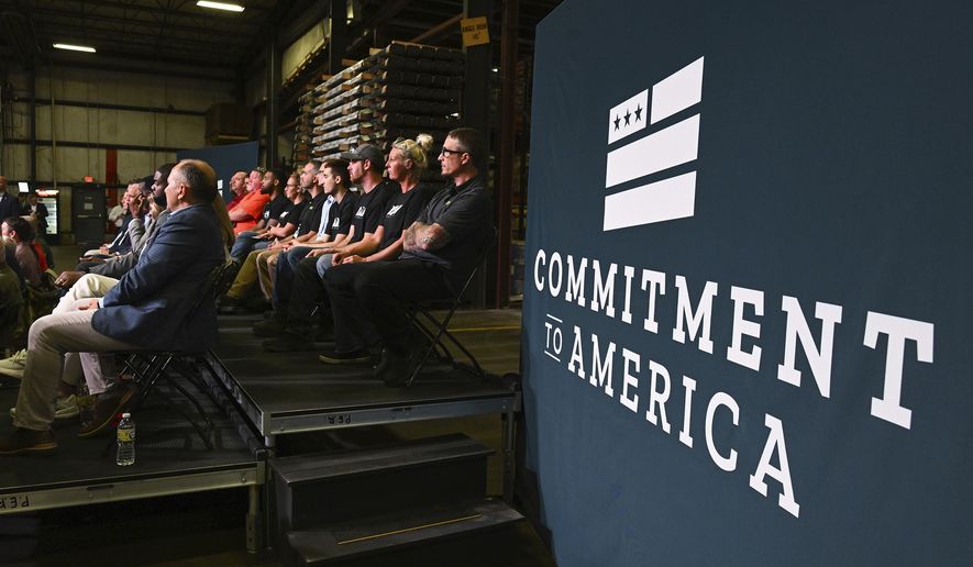 People listen as House Minority leader Kevin McCarthy, R-Calif., speaks at DMI Companies in Monongahela, Pa., Friday, Sept. 23, 2022. McCarthy joined with other House Republicans to unveil their &quot;Commitment to America&quot; agenda. (AP Photo/Barry Reeger)