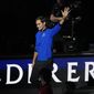 Team Europe&#39;s Roger Federer of Switzerland, waves during the opening ceremony of the Laver Cup tennis tournament at the O2 in London, Friday, Sept. 23, 2022. (AP Photo/Kin Cheung)