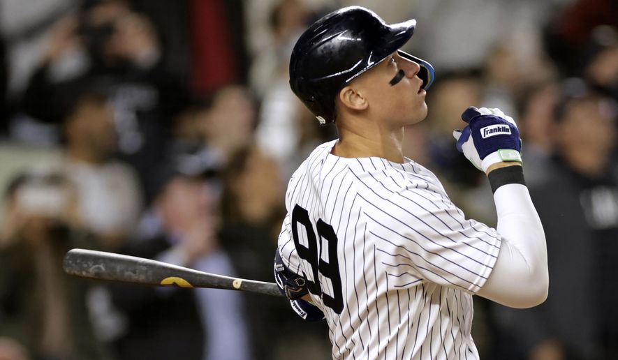 New York Yankees&#39; Aaron Judge flies out during the third inning of the team&#39;s baseball game against the Boston Red Sox on Friday, Sept. 23, 2022, in New York. (AP Photo/Adam Hunger)