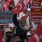 Demonstrators hold banners that read, &amp;quot;Law for the development of the spirit and moral&amp;quot; and &amp;quot;LGBTQ, remove your dirty hand from our children&amp;quot; during an anti LGBTQ protest in Fatih district of Istanbul, Sunday, Sept. 18, 2022. (AP Photo/Khalil Hamra, File)