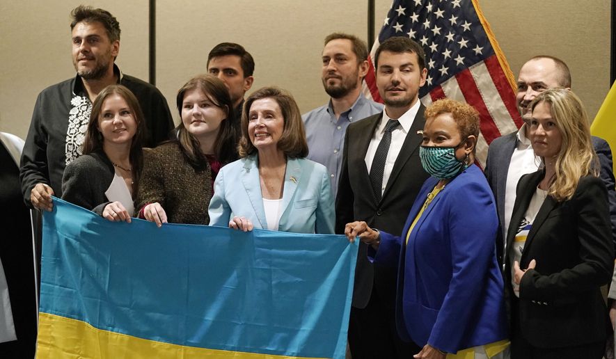 Speaker of the House Nancy Pelosi, D-Calif., poses with Ukrainian community leaders after holding a roundtable discussion at the San Francisco Federal Building Thursday, June 2, 2022. Third from right is Rep. Barbara Lee, D-Calif. (AP Photo/Eric Risberg)