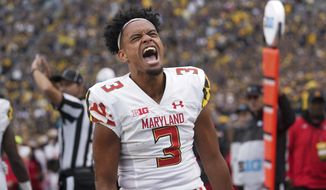 Maryland quarterback Taulia Tagovailoa reacts to a play against Michigan in the first half of an NCAA college football game in Ann Arbor, Mich., Saturday, Sept. 24, 2022. (AP Photo/Paul Sancya)