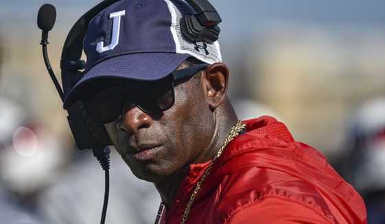 Jackson State head coach Deion Sanders looks on during an NCAA college football game against Mississippi Valley State in Jackson, Miss., Saturday, Sept. 24, 2022. (Hannah Mattix/The Clarion-Ledger via AP)