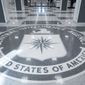 The seal of the Central Intelligence Agency is seen in the lobby the headquarters building in Langley, Va., on Saturday, Sept. 24, 2022. (AP Photo/Kevin Wolf)