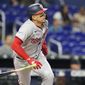 Washington Nationals&#39; Joey Meneses runs after hitting a tow run home run during the first inning of a baseball game against the Miami Marlins, Sunday, Sept. 25, 2022, in Miami.(AP Photo/Lynne Sladky)