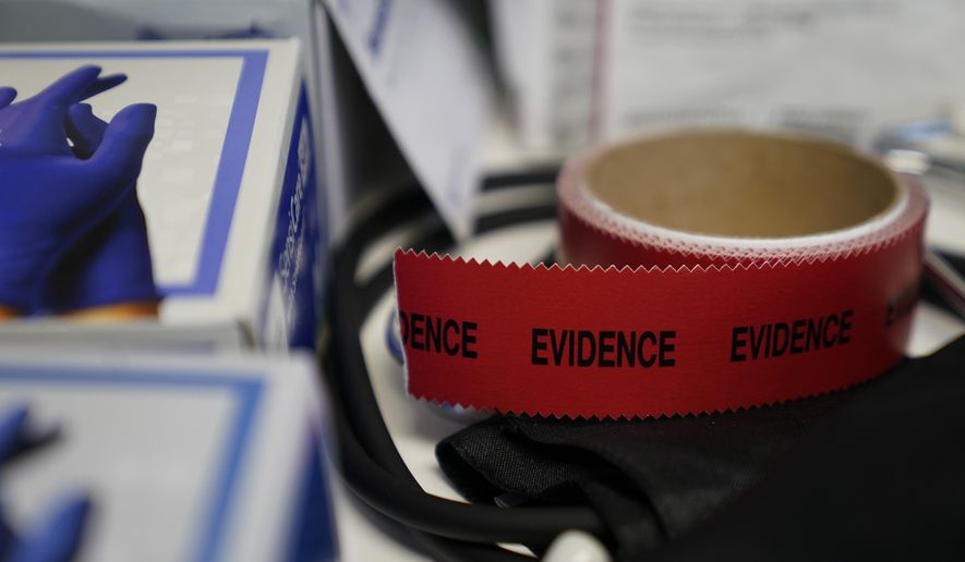Evidence tape is seen with a Sexual Assault Evidence Collection Kit in an examination room, Wednesday, Aug. 31, 2022, in Austin, Texas. After a Texas law banning abortions past about six weeks, even in cases of rape or incest, went into effect a year ago, Gov. Greg Abbott said the state would strive to &amp;quot;eliminate all rapists from the streets.&amp;quot; (AP Photo/Eric Gay)