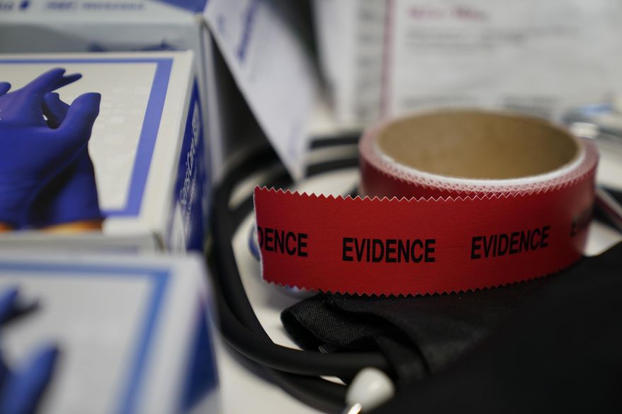 Evidence tape is seen with a Sexual Assault Evidence Collection Kit in an examination room, Wednesday, Aug. 31, 2022, in Austin, Texas. After a Texas law banning abortions past about six weeks, even in cases of rape or incest, went into effect a year ago, Gov. Greg Abbott said the state would strive to &amp;quot;eliminate all rapists from the streets.&amp;quot; (AP Photo/Eric Gay)