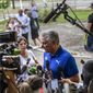 Cuba&#39;s President Miguel Diaz Canel speaks to the press after casting his vote at a polling station during the new Family Code referendum in Havana, Cuba, Sunday, Sept. 25, 2022. The draft of the new Family Code, which has more than 480 articles, was drawn up by a team of 30 experts, and it is expected to replace the current one that dates from 1975 and has been overtaken by new family structures and social changes. (AP Photo/Ramon Espinosa)