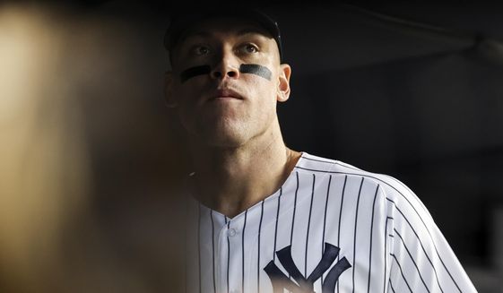 New York Yankees&#39; Aaron Judge looks out before a baseball game against the Boston Red Sox Sunday, Sept. 25, 2022, in New York. (AP Photo/Jessie Alcheh) **FILE**