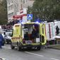 Police and paramedics work at the scene of a shooting at school No. 88 in Izhevsk, Russia, Monday, Sept. 26, 2022. A gunman on Monday morning killed 13 people and wounded 21 others in a school in central Russia, authorities said. Russia&#39;s Investigative Committee said in statement that seven children were among those killed in the shooting in the school in Izhevsk, a city about 960 kilometers (596 miles) east of Moscow in the Udmurtia region. (AP Photo)