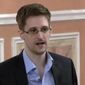 FILE - In this image made from video and released by WikiLeaks, former National Security Agency systems analyst Edward Snowden speaks in Moscow, Oct. 11, 2013. President Vladimir Putin has granted Russian citizenship to former U.S. security contractor Edward Snowden, according to a decree signed by the Russian leader on Monday Sept. 26, 2022.  (AP Photo, File)