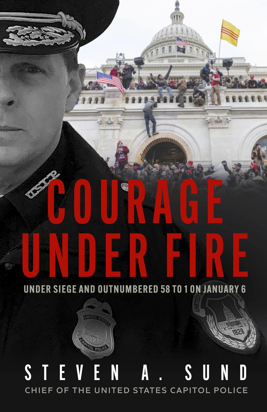 This cover image released by Blackstone Publishing shows "Courage Under Fire: Under Siege and Outnumbered 58 to 1 on January 6" by Steven A. Sund. (Blackstone Publishing via AP)