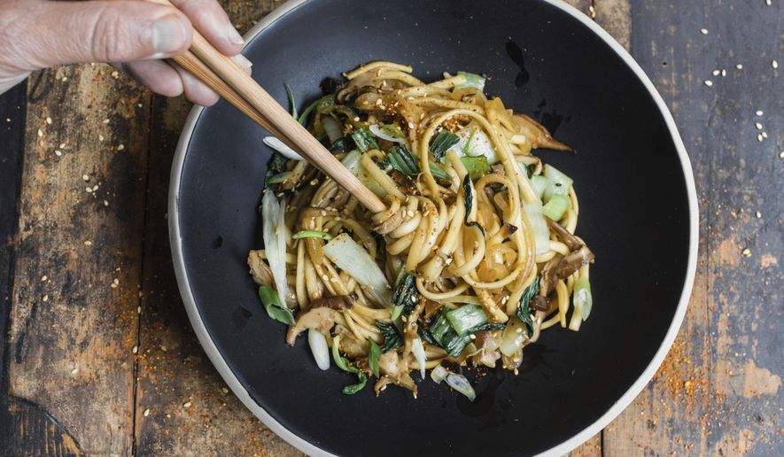 This image released by Milk Street shows a recipe for Yakiudon with Pickled Ginger. (Milk Street via AP)