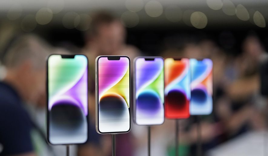 New iPhone 14 models on display at an Apple event on the campus of Apple&#39;s headquarters in Cupertino, Calif., Sept. 7, 2022. (AP Photo/Jeff Chiu, File)