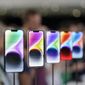 New iPhone 14 models on display at an Apple event on the campus of Apple&#39;s headquarters in Cupertino, Calif., Sept. 7, 2022. Apple Inc. will manufacture its latest iPhone 14 in India, the company said on Monday, as it seeks to curb its production in China. (AP Photo/Jeff Chiu, File)
