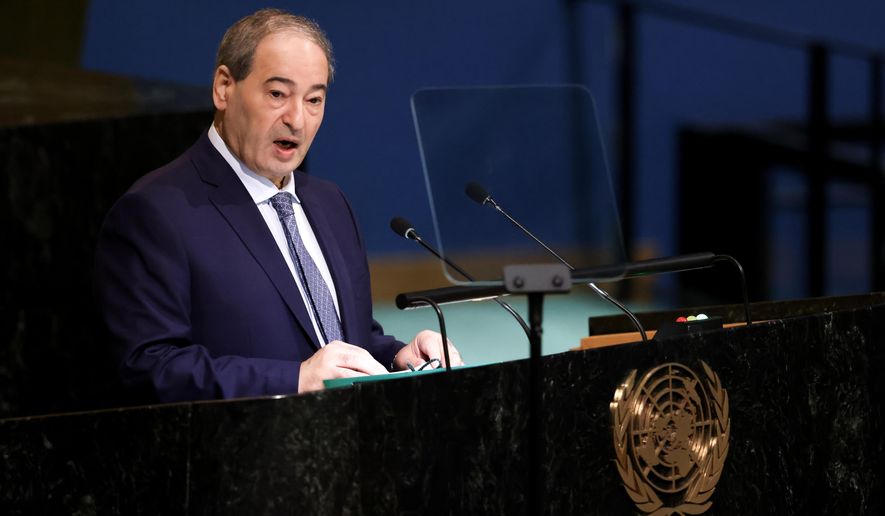 Minister for Foreign Affairs of Syria Fayssal Mekdad addresses the 77th session of the United Nations General Assembly, Monday, Sept. 26, 2022, at the U.N. headquarters. (AP Photo/Julia Nikhinson)