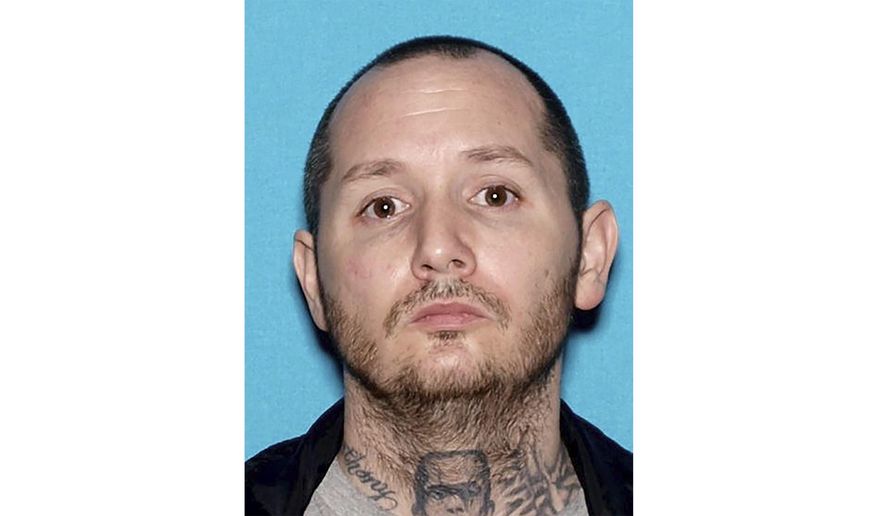 This undated photo provided by the City of Fontana Police Department shows, 45-year-old Anthony John Graziano who is a suspect in a shooting incident. A Southern California woman was shot to death Monday, Sept. 26, 2022, in a domestic violence incident and police said the suspect, Graziano, is believed to be on the run with his 15-year-old daughter. Officers responding around 7:30 a.m. to reports of gunfire found the victim with multiple gunshot wounds at a home in Fontana, police said in a statement. (Courtesy of City of Fontana Police Department via AP)