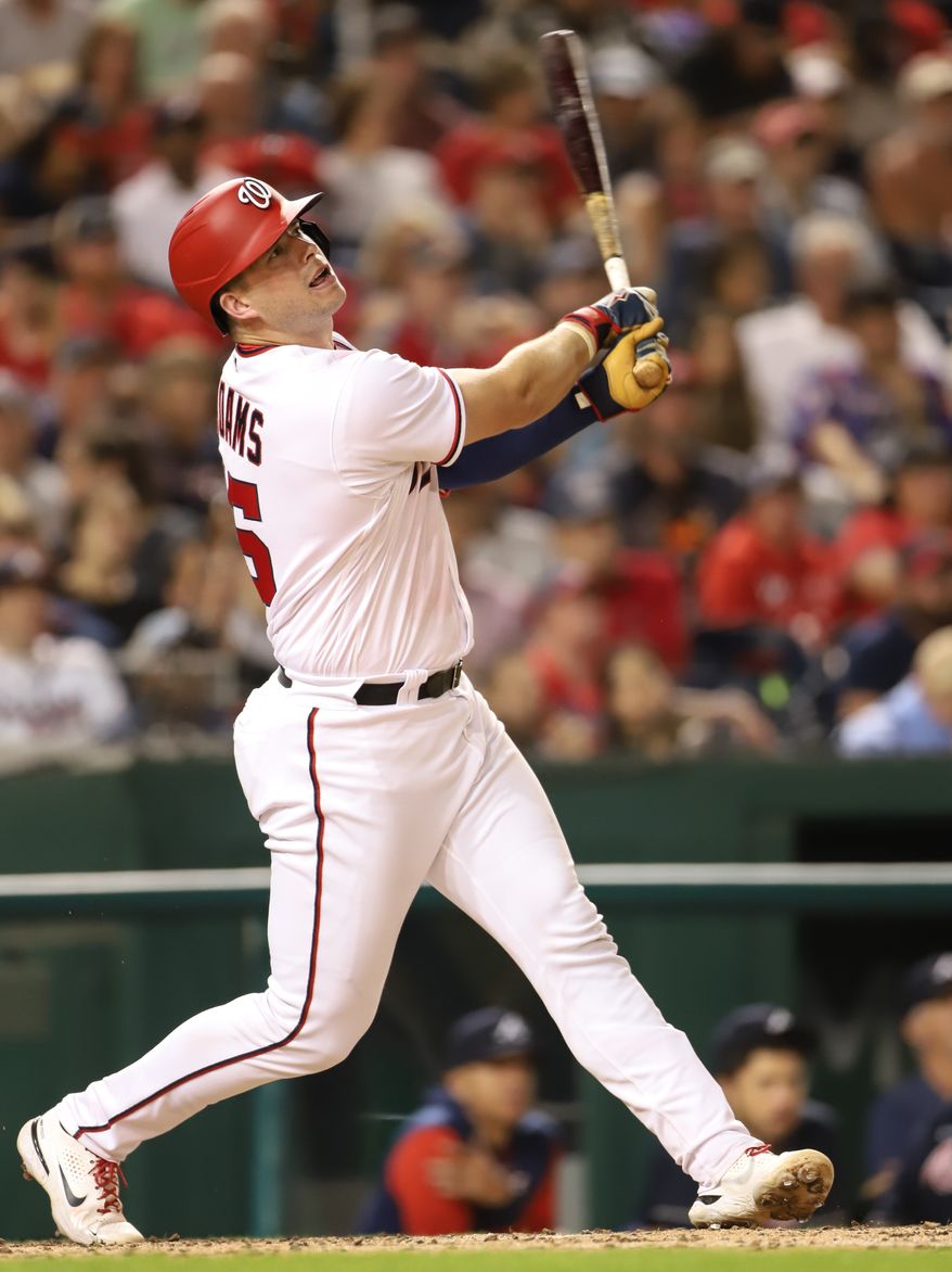 Washington Nationals Catcher Riley Adams (15) takes a swing while at bat at the Atlanta Braves vs Washington Nationals game at Nationals Park in Washington D.C. on September 26th 2022 (Photo: All-Pro Reels/Alyssa Howell)