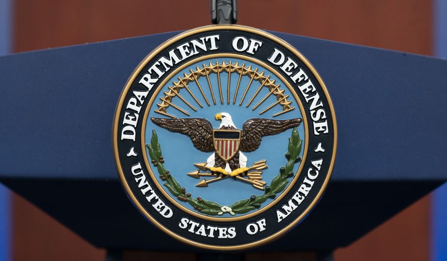 The seal of the Department of Defense is seen on the podium before Pentagon spokesman U.S. Air Force Brig. Gen. Patrick Ryder speaks during a media briefing at the Pentagon, Tuesday, Sept. 27, 2022, in Washington. (AP Photo/Alex Brandon)