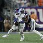 Dallas Cowboys cornerback Anthony Brown (3) strips the ball from New York Giants wide receiver Sterling Shepard (3) during the fourth quarter of an NFL football game, Monday, Sept. 26, 2022, in East Rutherford, N.J. (AP Photo/Adam Hunger) **FILE**