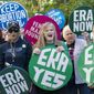 Demonstrators protest outside of the federal courthouse asking congress to pass the equal rights amendment, during a rally in Washington, Wednesday, Sept. 28, 2022. ( AP Photo/Jose Luis Magana)