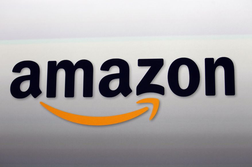 This Sept. 6, 2012, file photo, shows the Amazon logo in Santa Monica, Calif. Amazon has centralized its services for customers receiving government assistance into one new hub the company announced Monday. (AP Photo/Reed Saxon, File)