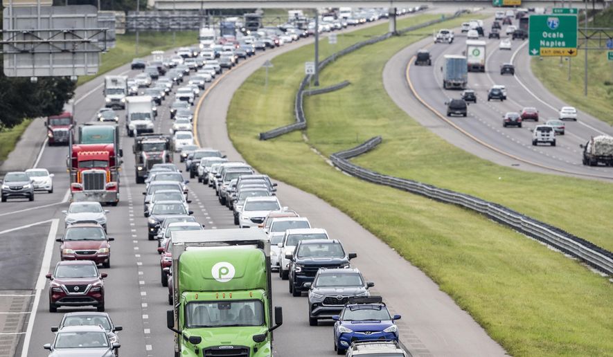 Traffic builds along Interstate 4 in Tampa, Fla., Tuesday, Sept. 27, 2022, as Hurricane Ian approaches. (Willie J. Allen Jr./Orlando Sentinel via AP) **FILE**