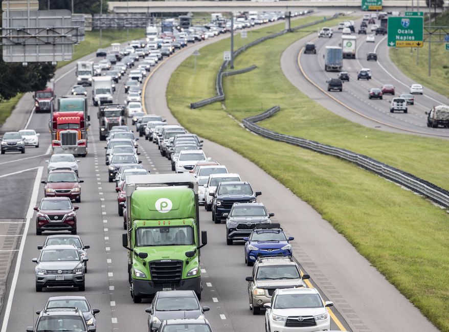 Traffic builds along Interstate 4 in Tampa, Fla., Tuesday, Sept. 27, 2022, as Hurricane Ian approaches. (Willie J. Allen Jr./Orlando Sentinel via AP) **FILE**