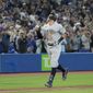 New York Yankees&#x27; Aaron Judge celebrates his 61st home run of the season, a two-run shot against the Toronto Blue Jays during the seventh inning of a baseball game Wednesday, Sept. 28, 2022, in Toronto. (Nathan Denette/The Canadian Press via AP) **FILE**