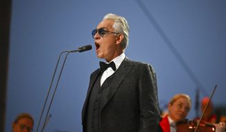 Andrea Bocelli performs at the Platinum Jubilee concert taking place in front of Buckingham Palace, London, Saturday June 4, 2022, on the third of four days of celebrations to mark the Platinum Jubilee. (Jeff J Mitchell /Pool photo via AP)