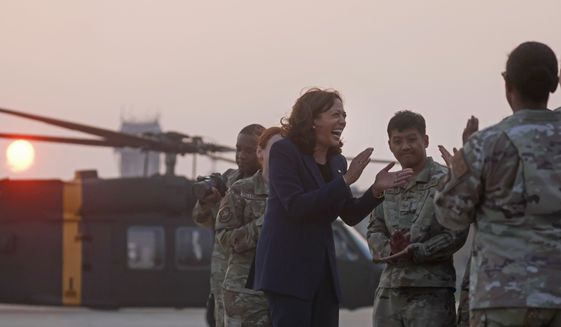 U.S. Vice President Kamala Harris, center, meets soldiers before her departure from the demilitarized zone (DMZ) separating the two Koreas, in Panmunjom, South Korea Thursday, Sept. 29, 2022. (Leah Millis/Pool Photo via AP)