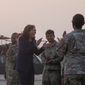 U.S. Vice President Kamala Harris, center, meets soldiers before her departure from the demilitarized zone (DMZ) separating the two Koreas, in Panmunjom, South Korea Thursday, Sept. 29, 2022. (Leah Millis/Pool Photo via AP)