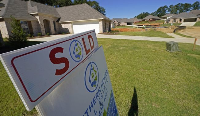 A &quot;SOLD&quot; sign decorates the lawn of a new house in Pearl, Miss., on Sept. 23, 2021. Homeowner equity climbed to record highs in the first half of 2022, though its rate of growth is slowing as the housing market cools. (AP Photo/Rogelio V. Solis) **FILE**