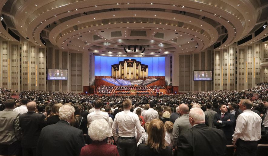 Mormons listen during The Church of Jesus Christ of Latter-day Saints&#39; twice-annual church conference on Oct. 5, 2019, in Salt Lake City. Tens of thousands of members of The Church of Jesus Christ of Latter-day Saints are scheduled to attend the faith’s biannual conference this weekend, in which senior leaders will address nearly 17 million believers throughout the world from their headquarters in Utah. (AP Photo/Rick Bowmer, File)