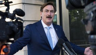 MyPillow chief executive Mike Lindell, speaks to reporters outside federal court in Washington, June 24, 2021. The Supreme Court says it won’t intervene in a lawsuit in which Dominion Voting Systems accused MyPillow chief executive Mike Lindell of defamation for falsely accusing the company of rigging the 2020 presidential election against former President Donald Trump. (AP Photo/Manuel Balce Ceneta, File)