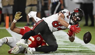 Tampa Bay Buccaneers tight end Cameron Brate (84) misses a catch during the first half of an NFL football game against the Kansas City Chiefs Sunday, Oct. 2, 2022, in Tampa, Fla. (AP Photo/Jason Behnken) **FILE**
