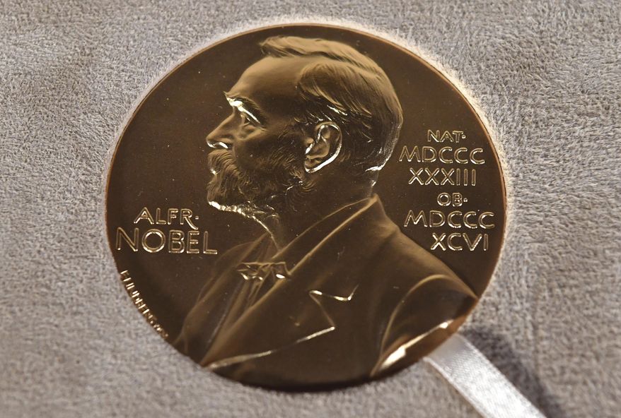 A Nobel medal displayed during a ceremony in New York, Tuesday, Dec. 8, 2020. (Angela Weiss/Pool Photo via AP, File)