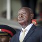 FILE - Uganda&#x27;s President Yoweri Museveni attends the state funeral of Kenya&#x27;s former president Daniel Arap Moi in Nairobi, Kenya on Feb. 11, 2020. Uganda&#x27;s President Yoweri Museveni fired his son Muhoozi Kainerugaba as commander of the nation&#x27;s infantry forces Tuesday, Oct. 4, 2022 after the son tweeted an unprovoked threat to capture the capital of neighboring Kenya, drawing widespread concern in East Africa. (AP Photo/John Muchucha, File)