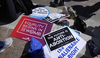 Demonstrators turn out for “Ohio March for Life” to support ending abortion access in Ohio at the Statehouse in Columbus, Ohio on Wednesday, Oct. 5, 2022. (Barbara Perenic /The Columbus Dispatch via AP)