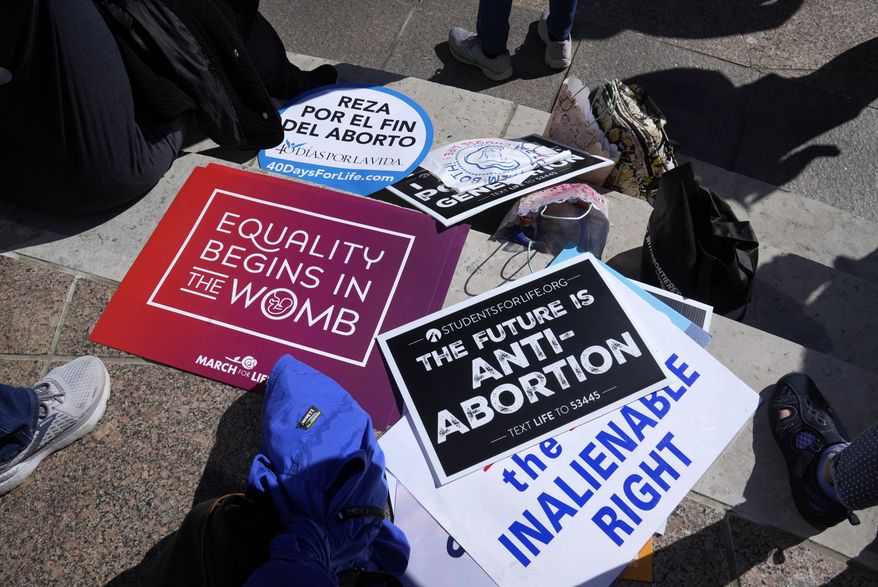 Demonstrators turn out for “Ohio March for Life” to support ending abortion access in Ohio at the Statehouse in Columbus, Ohio on Wednesday, Oct. 5, 2022. (Barbara Perenic /The Columbus Dispatch via AP)