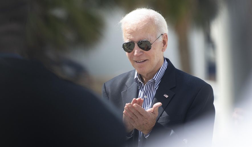 President Joe Biden visits Fisherman&#39;s Wharf at Fort Myers Beach, Fla., Wednesday, Oct. 5, 2022, to see the damage caused by Hurricane Ian. (Saul Young/Knoxville News Sentinel via AP, Pool)